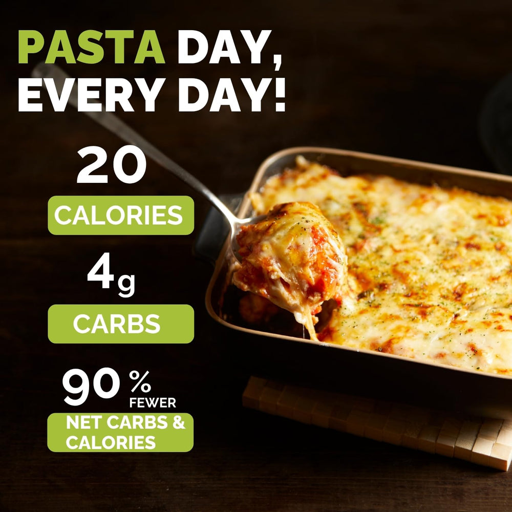 Cooked Palmini lasagna plated with sauce and cheese showing texture