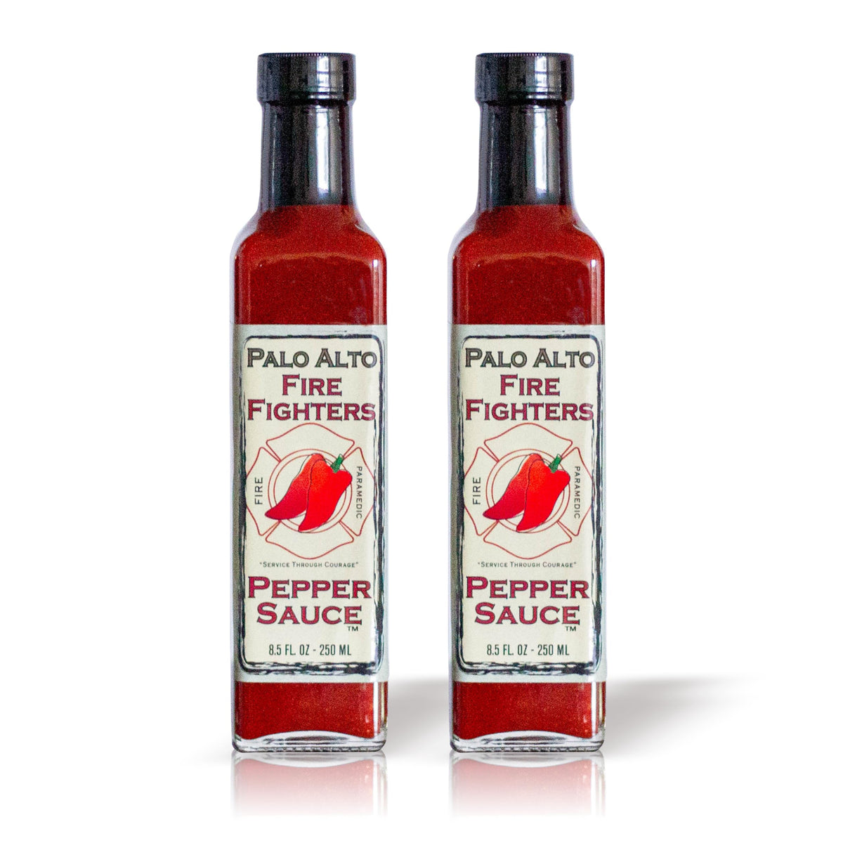 Palo Alto Firefighters Pepper Sauce bottle on counter, salt-free flavor enhancer.