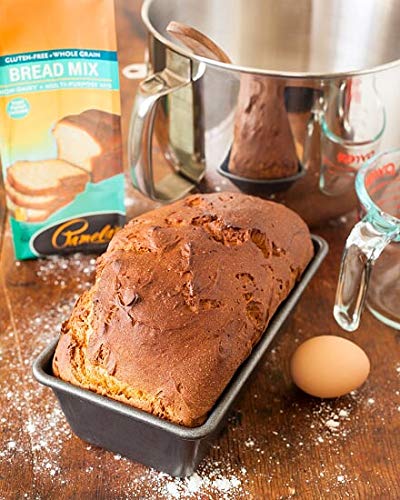 Sliced Pamela's Gluten Free Bread Mix loaf on a board, fresh and tender