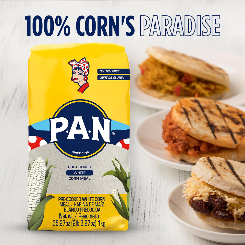Arepa cooking on a hot griddle using P.A.N. corn meal