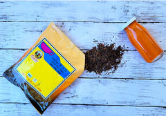 Pantai Norasingh Thai tea packaging shows six 1-lb bags for multiple servings.