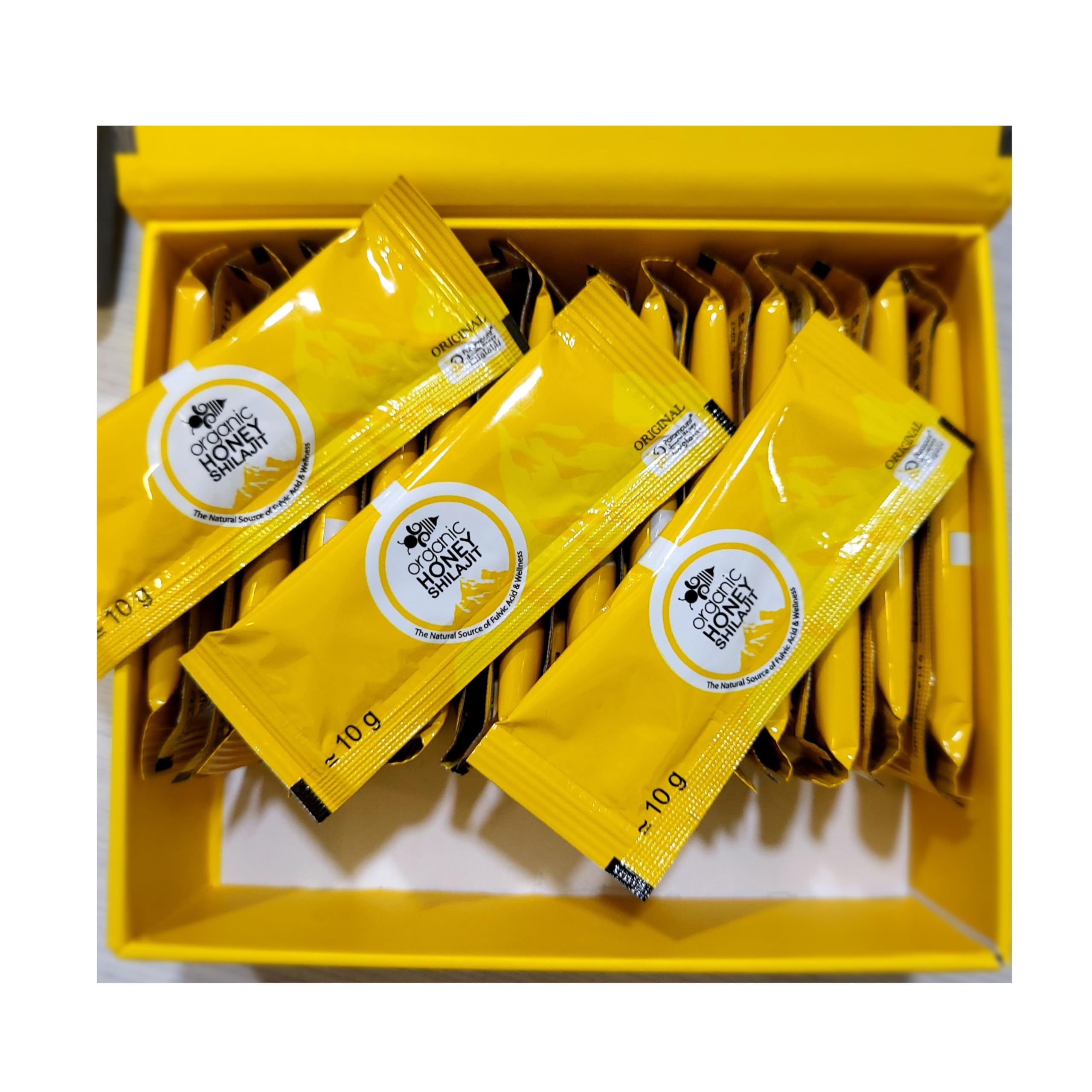 Paramount Honey Shilajit label closeup underscores royal jelly, bee pollen, herbal extracts.