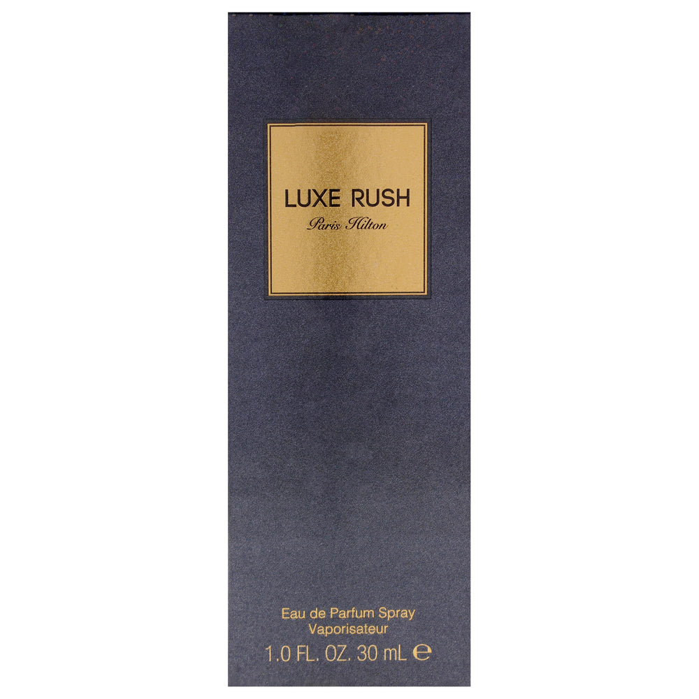 Paris Hilton Luxe Rush packaging display highlighting premium look