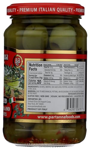 Partanna olives on a cheese board pairing with cheeses and charcuterie