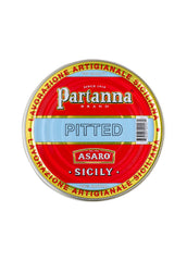 Partanna Castelvetrano green olives on a cheese board, ideal for gourmet entertaining.