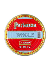 Partanna Castelvetrano olives in a jar; vibrant green color, mild brininess.