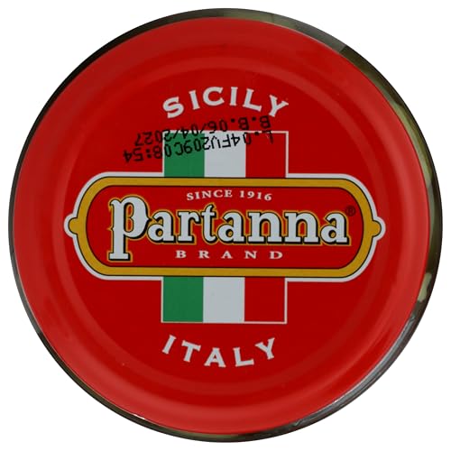 Partanna olives and Sicilian lemons on a platter, ideal for Mediterranean dining