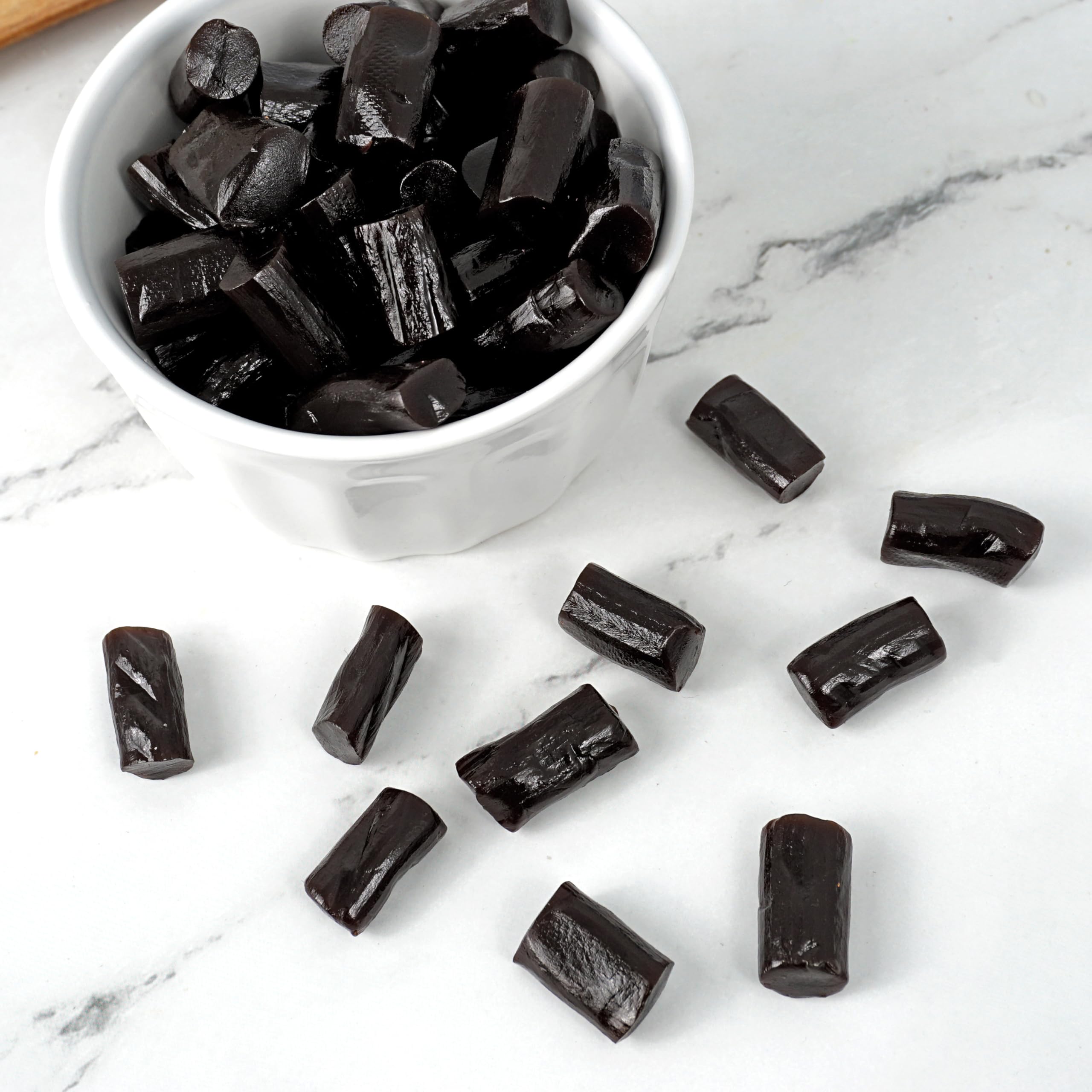 Party scene with Finnska sugar-free licorice, perfect for sharing