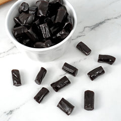 Party scene with Finnska sugar-free licorice, perfect for sharing