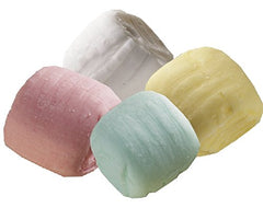 Bowl display of Party Sweets pastel buttermints at a party table
