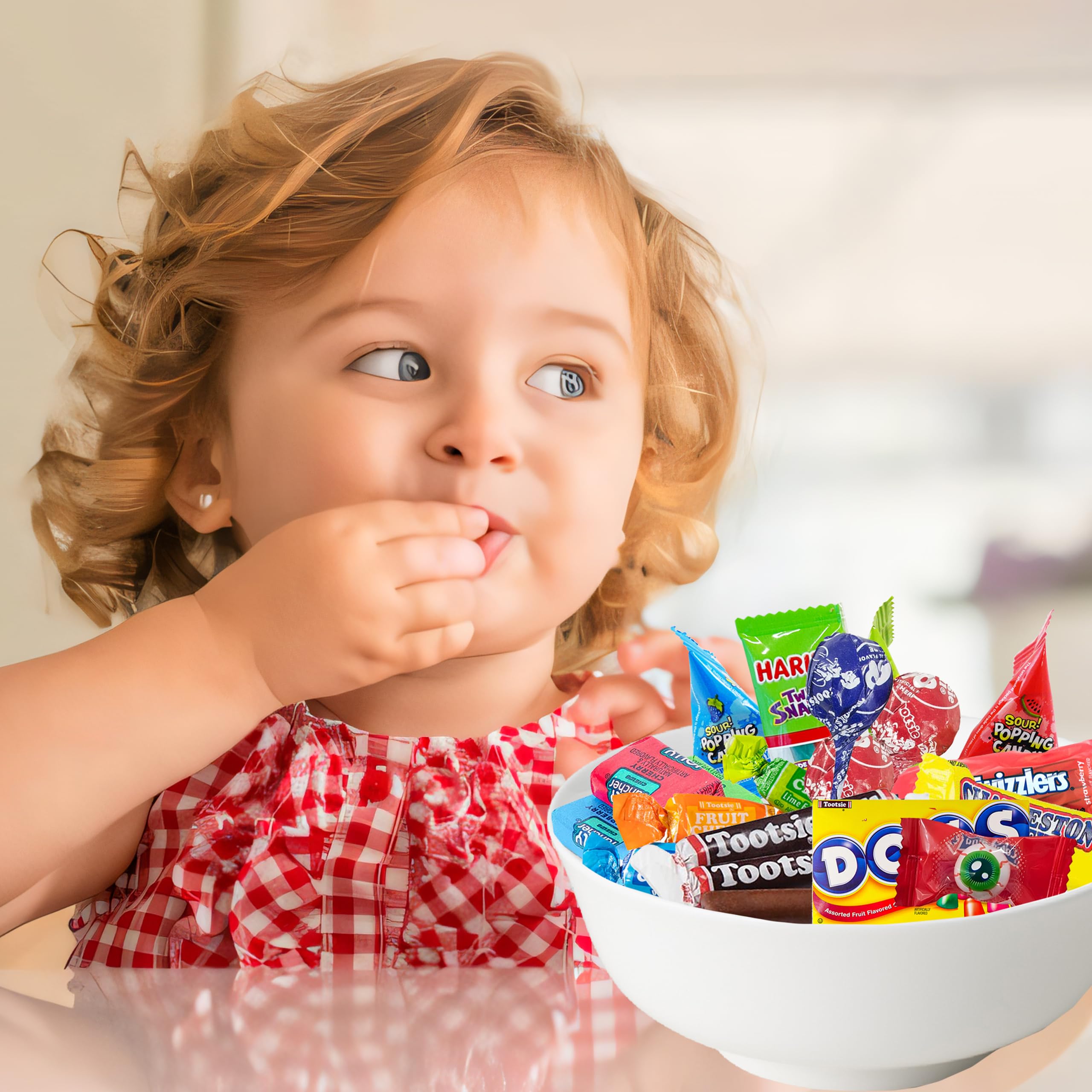 Partypom gummy snakes and eyeball candy add playful bowls.