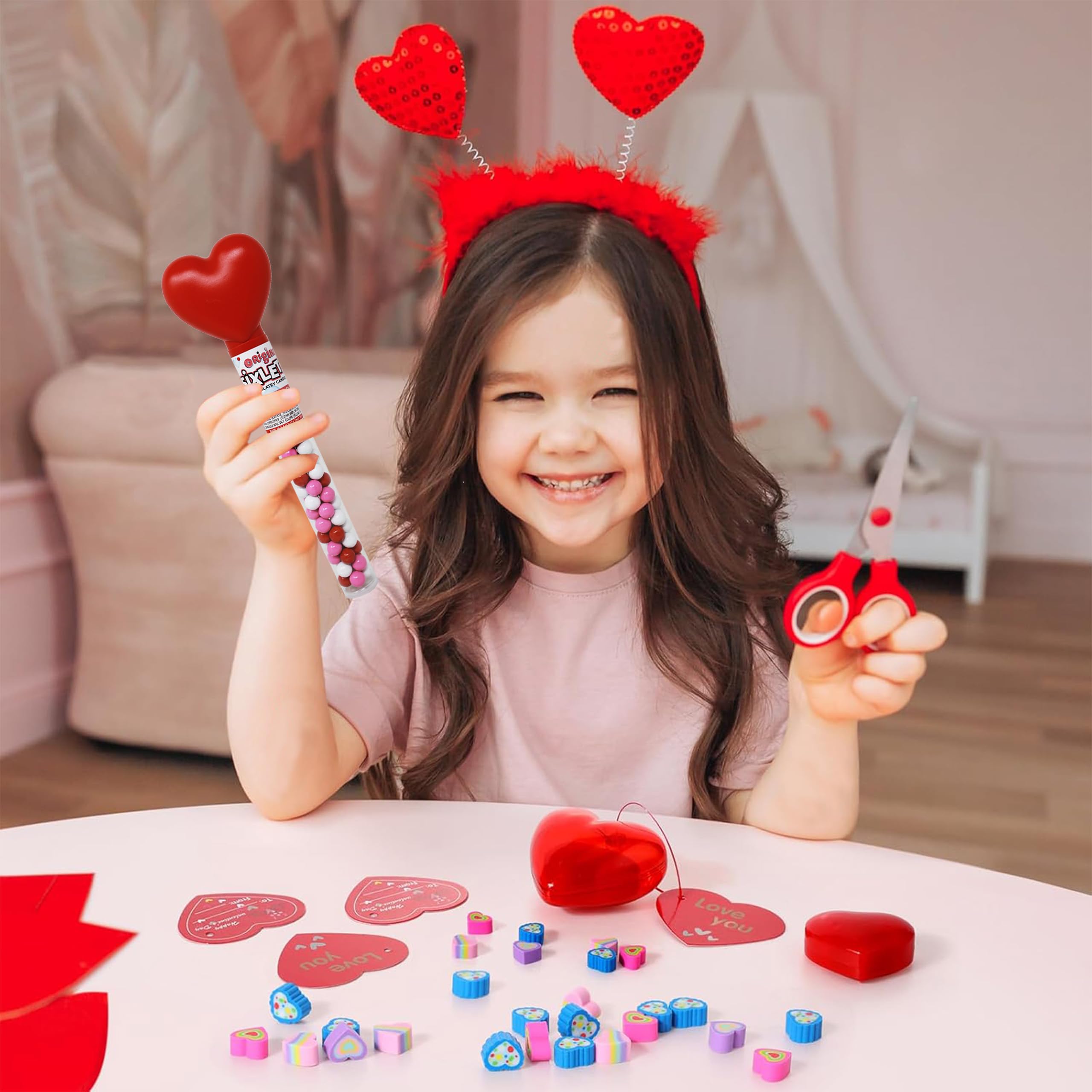 Partypom Valentines white heart tubes with bright candy-coated chocolates