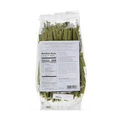 Uncooked spinach fettuccine strands from Pasta Deliziosa show natural emerald color.
