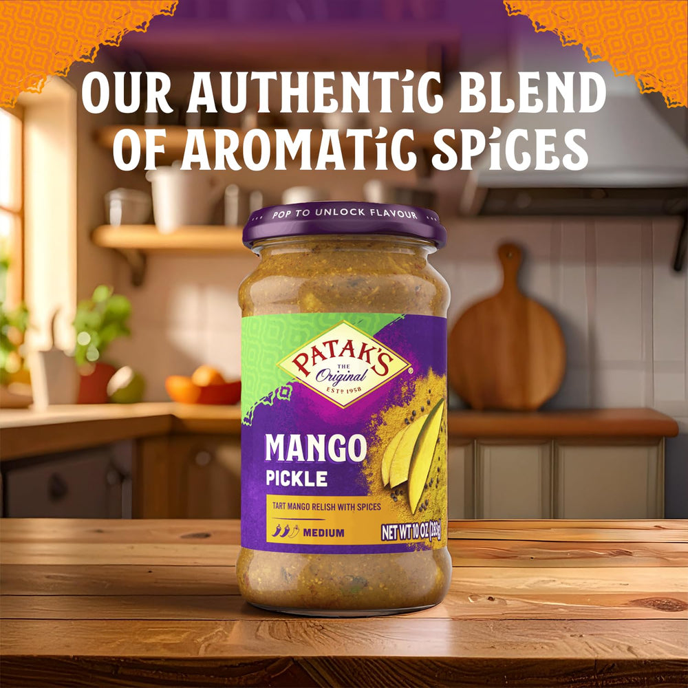 Open Patak's Mango Pickle jar reveals vibrant color and aroma