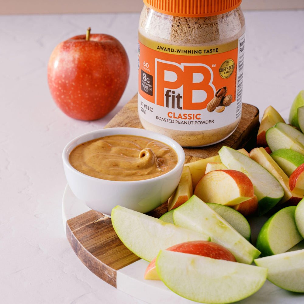 PBfit Classic Peanut Butter Powder being stirred for baking and recipes