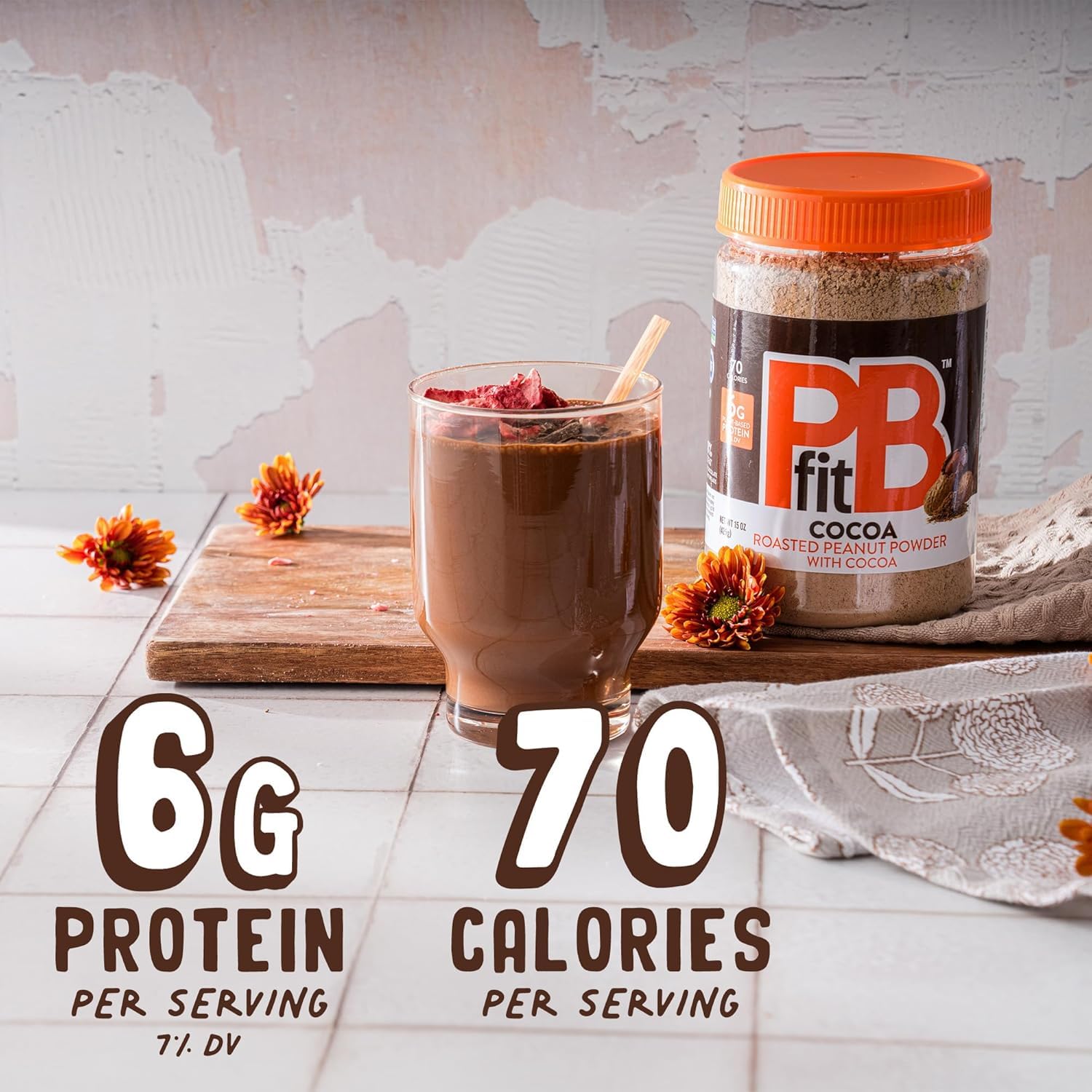 PBfit Cocoa Peanut Butter Powder poured into water for a quick shake.