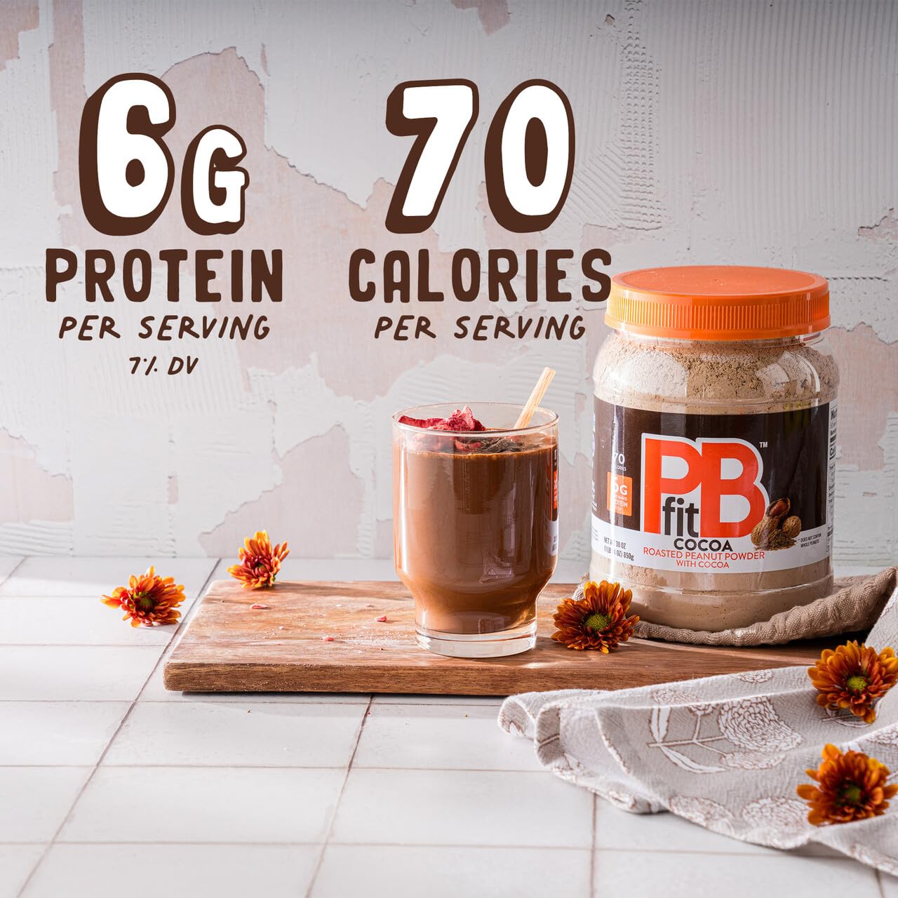 PBfit Cocoa Peanut Butter Powder scoop ready to mix into smoothies
