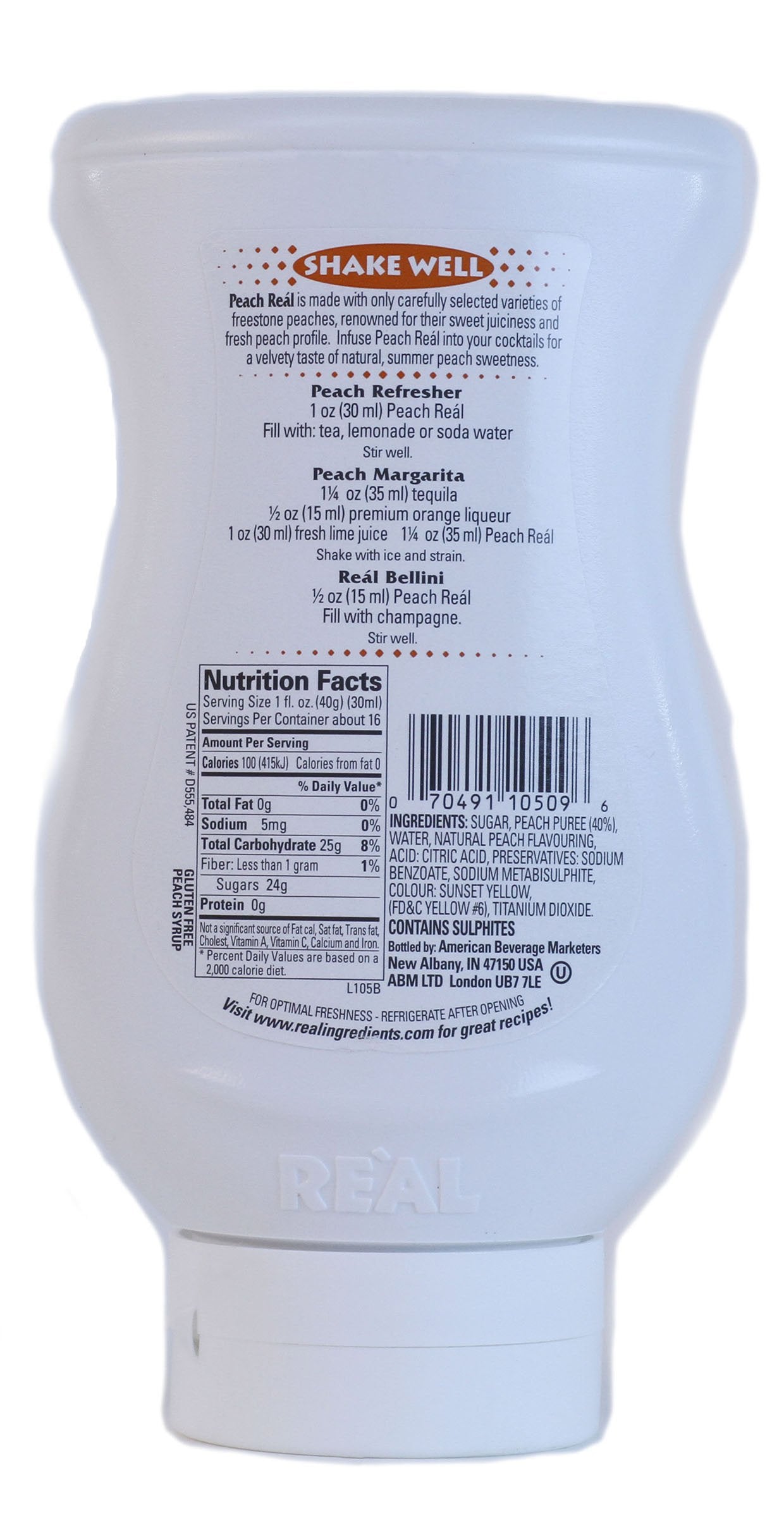 Peach Real syrup bottle in a glass, vibrant color enhances mocktails and iced beverages.