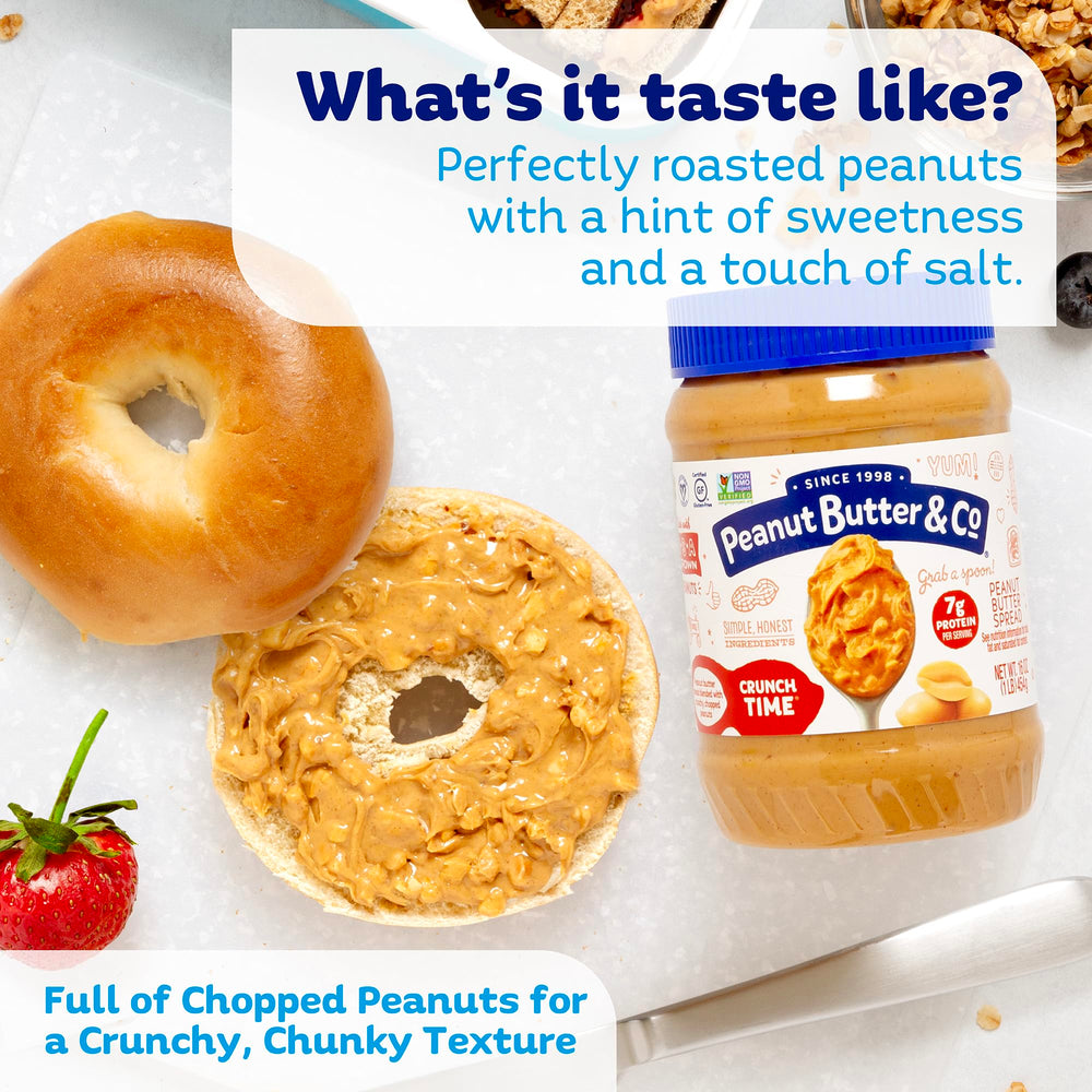 Spoon dipping into Crunch Time jar highlighting chunky peanut butter.