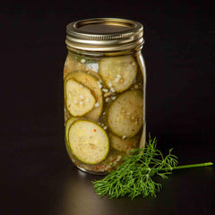 Finished dill pickles in a jar ready for sharing with Pearl and Johnny.