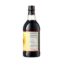 Pour Pearl River Bridge Light Soy Sauce to enhance a dish