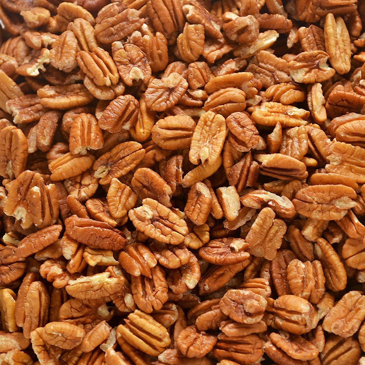 Pecan Shop raw pecan halves in bag, ideal for snacking and baking.