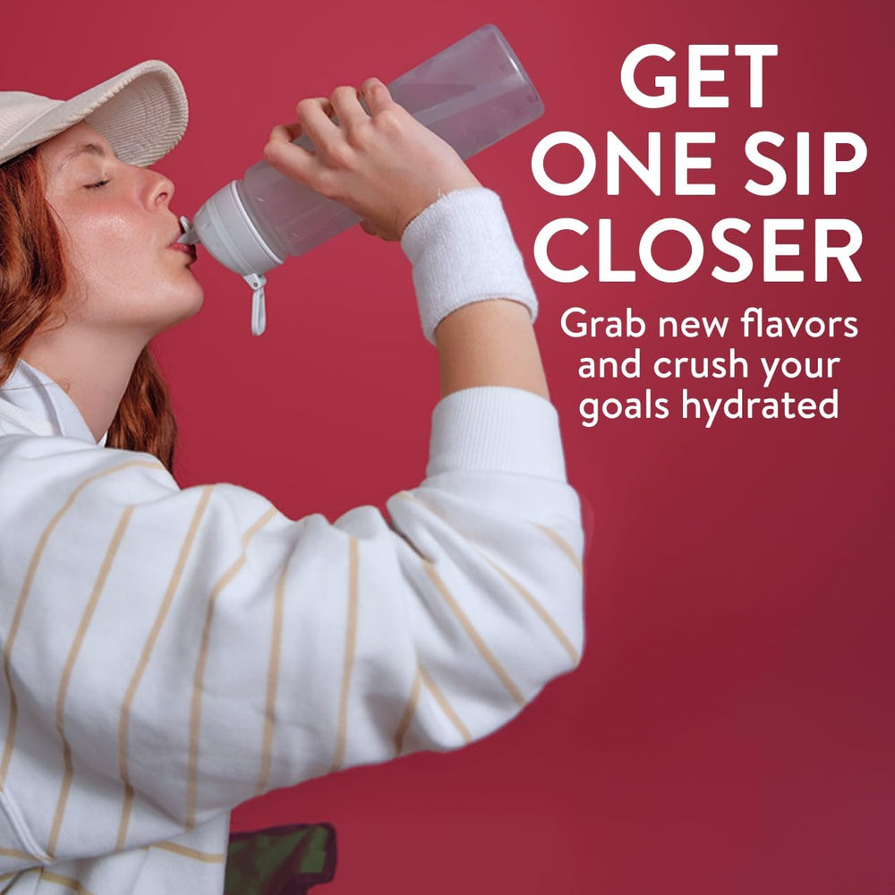 Pouring Pedialyte Electrolyte Water Strawberry Smash to illustrate quick hydration during workouts.