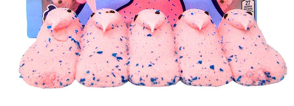 Peeps Easter Chicks unwrapped to reveal soft marshmallow shapes.