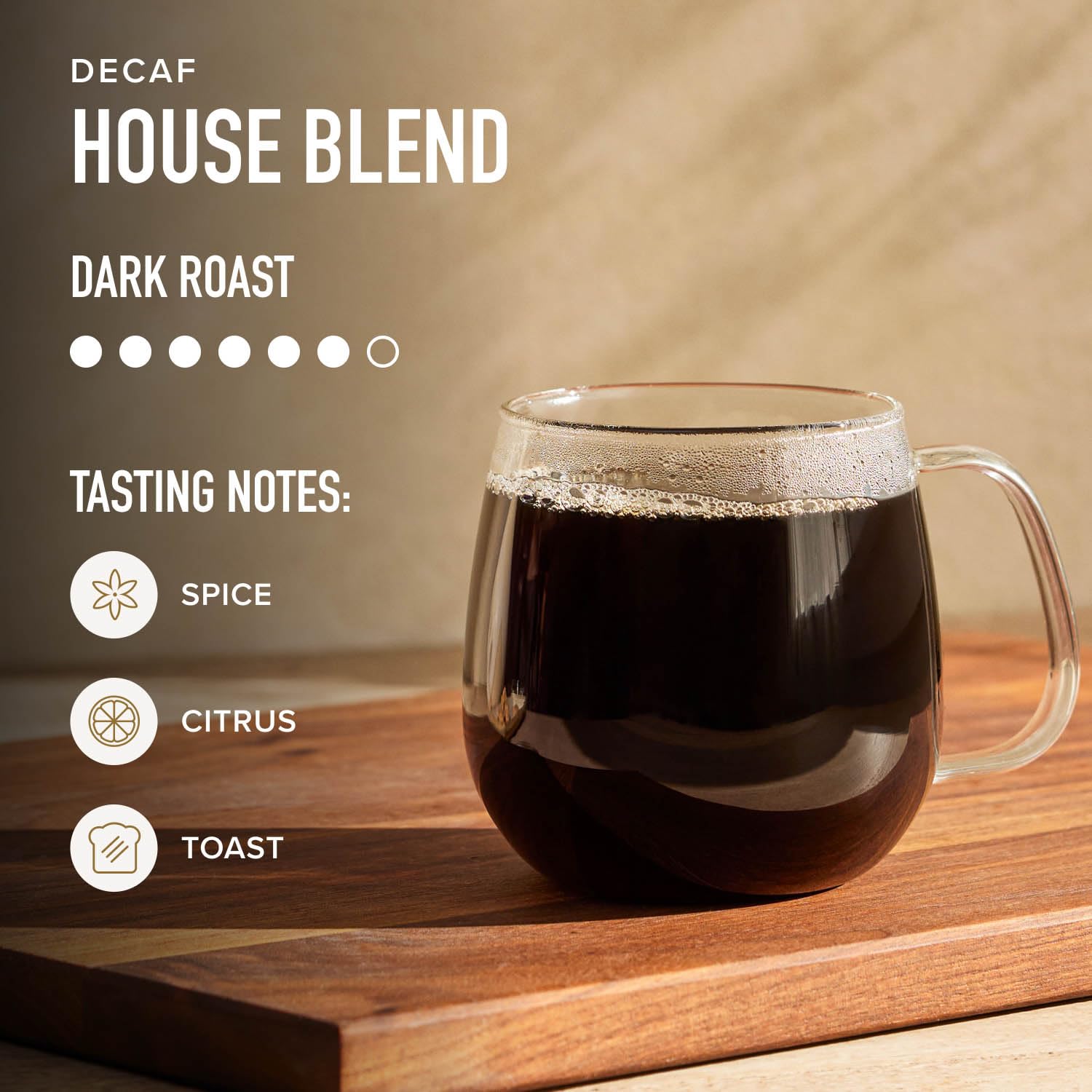 Ceramic mug beside the Decaf House Blend label for a comforting moment.