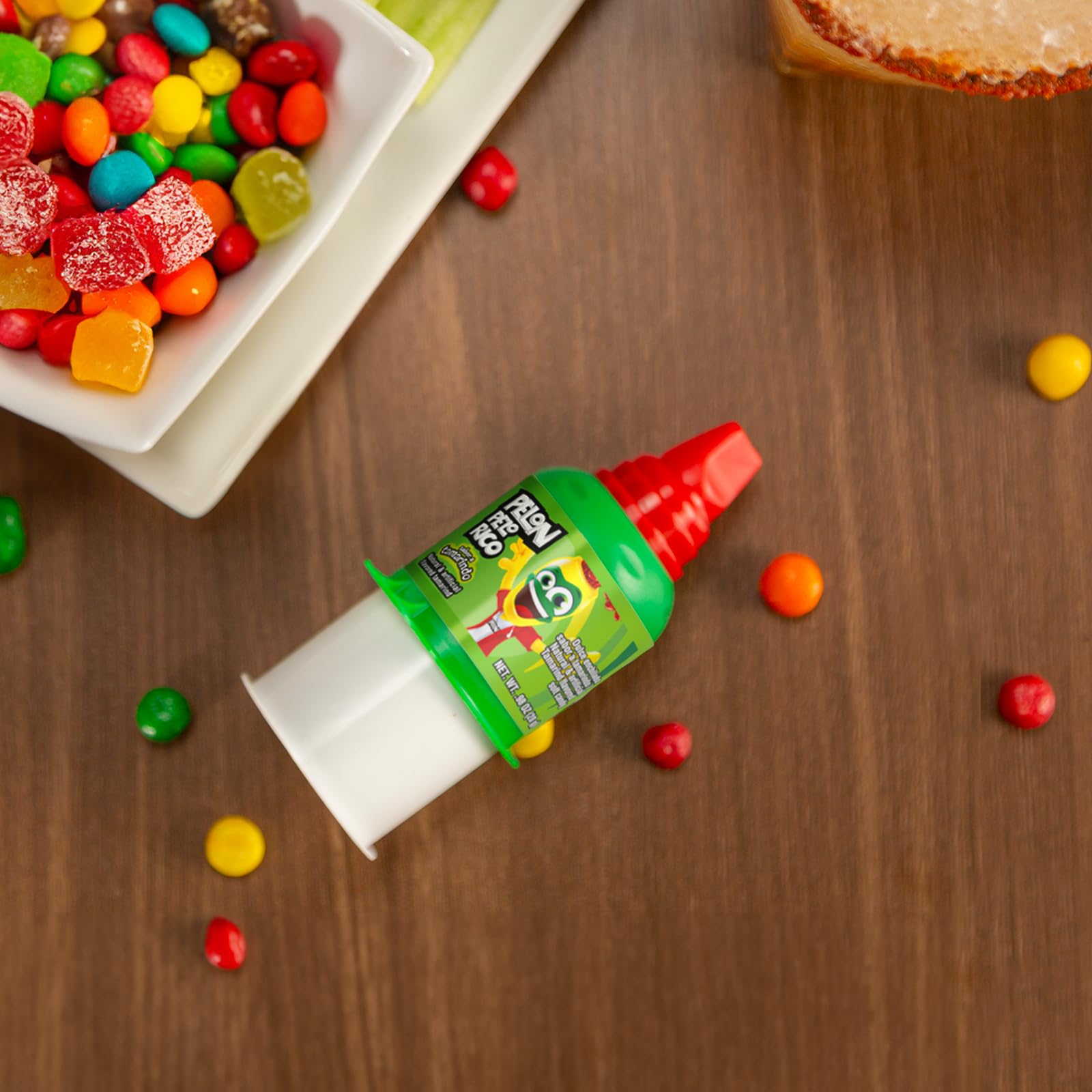 Pelon Pelo Rico tamarind 1oz bottle close-up shows creamy pulp and tang.