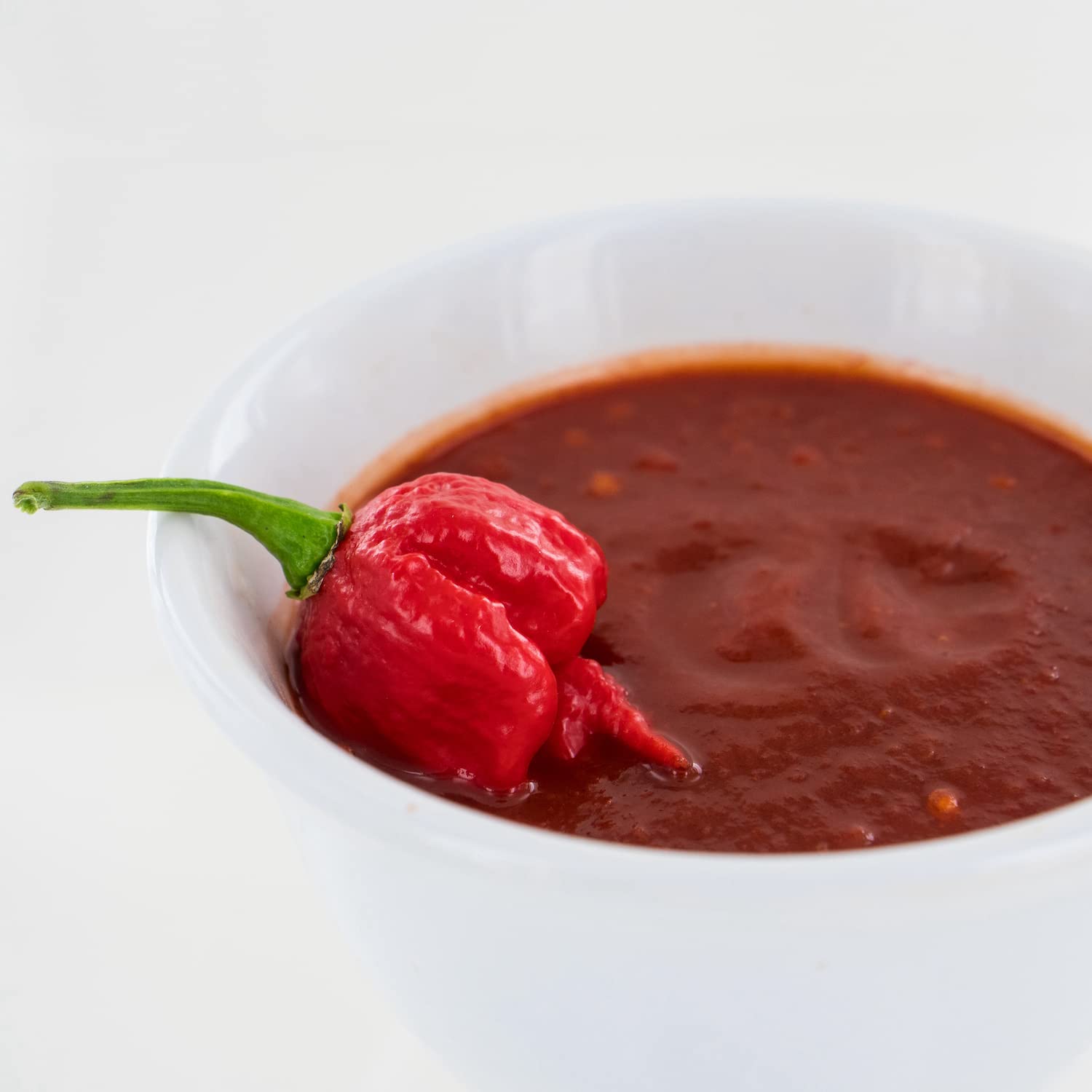 Pepper Joe's Carolina Reaper Mash ingredients highlight fermented peppers for complex umami.