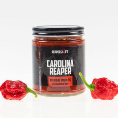 Pepper Joe's Carolina Reaper Mash jar front label highlights intense heat for bold dishes.