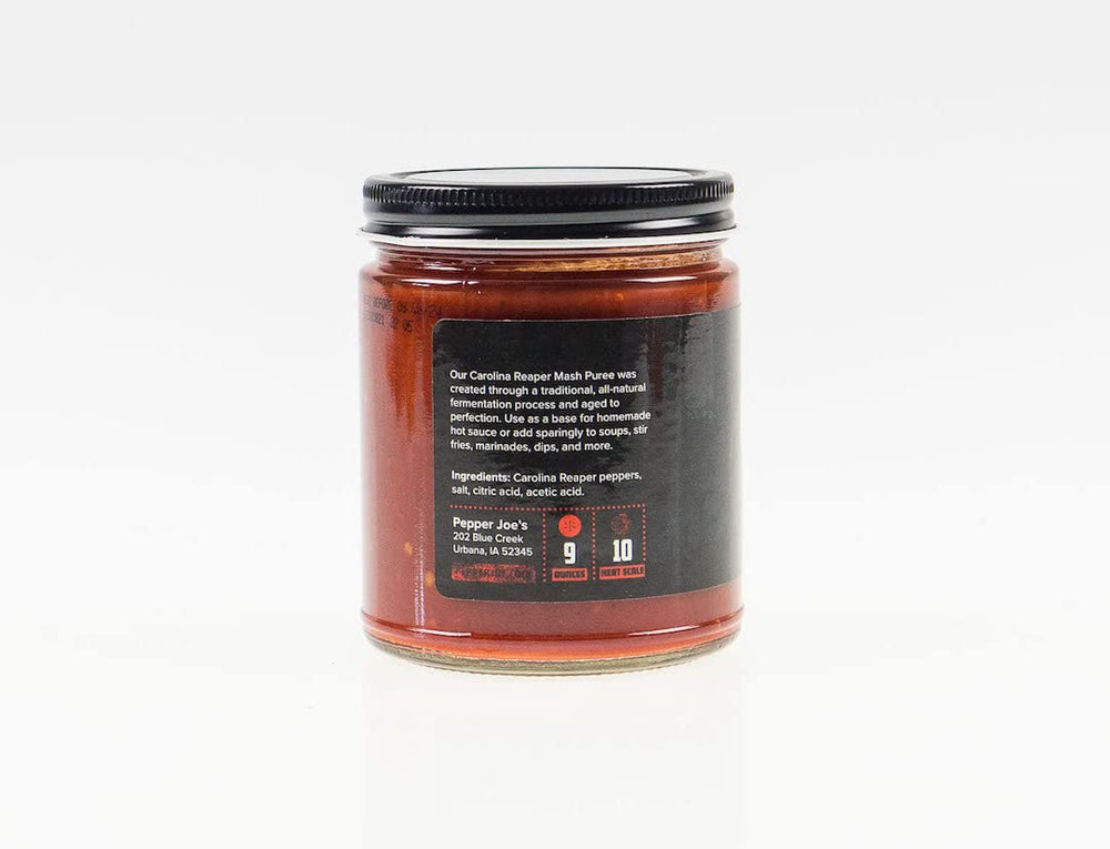 Pepper Joe's Carolina Reaper Mash label closeup emphasizes fermentation depth and aroma.