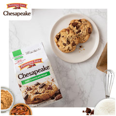 Hand holding a Chesapeake cookie showing Pepperidge Farm size and crispy snap