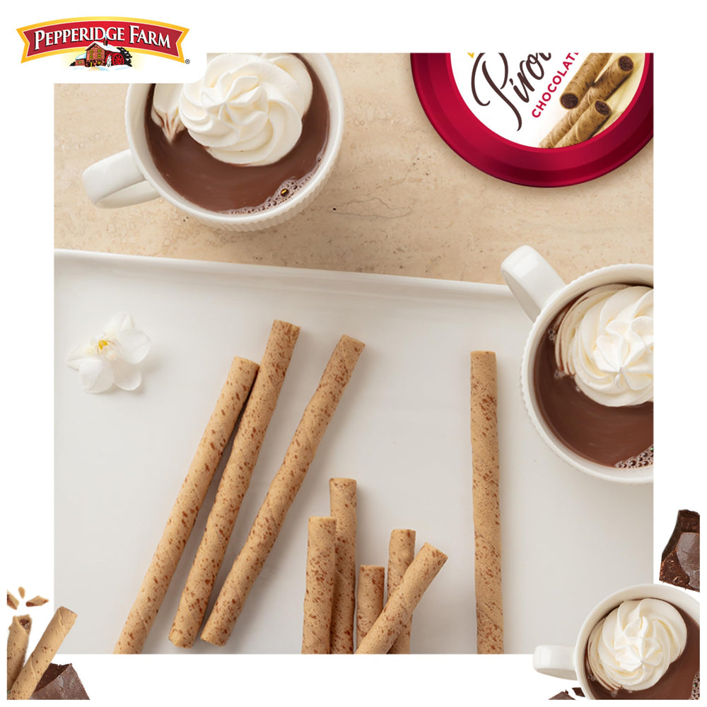 Pepperidge Farm Pirouette wafers with tea, crisp bite for morning ritual.