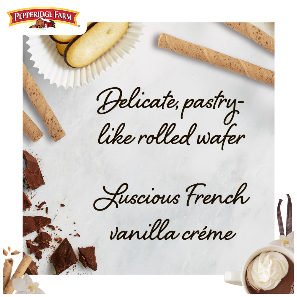 Pirouette tin open to reveal delicate vanilla creme-filled wafers.
