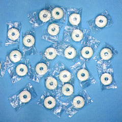 Individually wrapped Peppermint Lifesavers close-up highlighting on-the-go use.