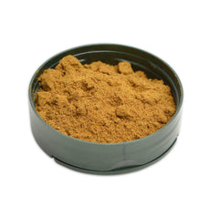 Pereg Ras El Hanout spice blend in a bowl, ideal for rubs and stews.