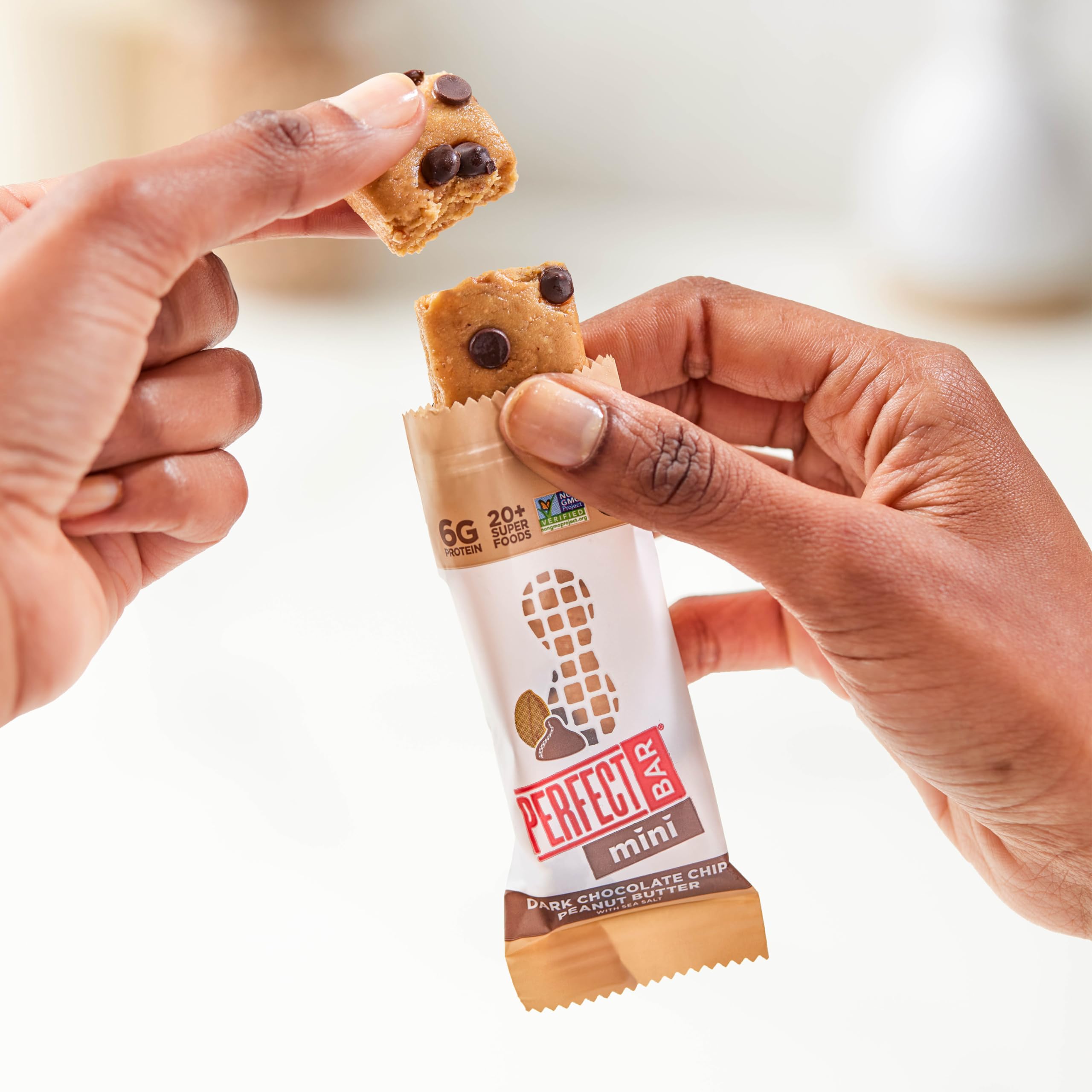 Perfect Bar Mini texture close-up, creamy peanut butter and chocolate chips.