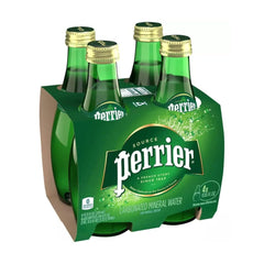 Perrier pour into a glass, crisp sparkle enhancing meals