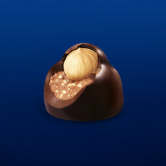 Open Perugina Baci packaging displaying individually wrapped chocolates.