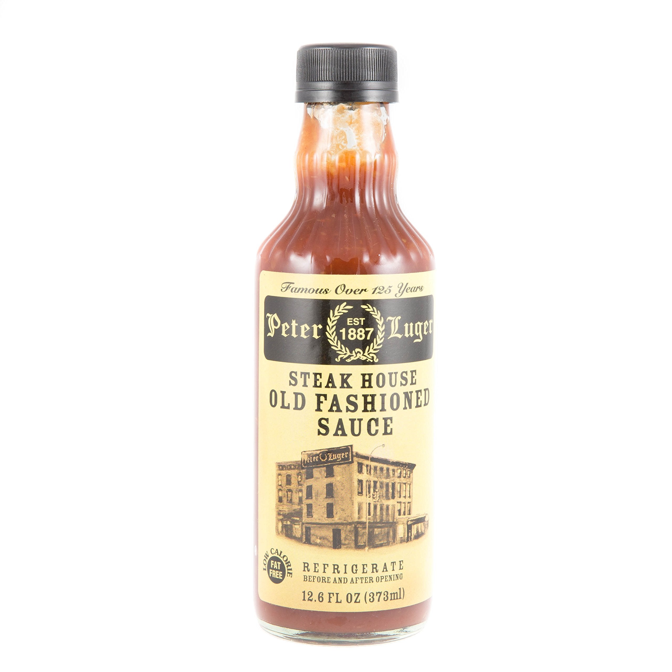 Peter Luger Steak Sauce bottle pour; bold horseradish tang for steaks.