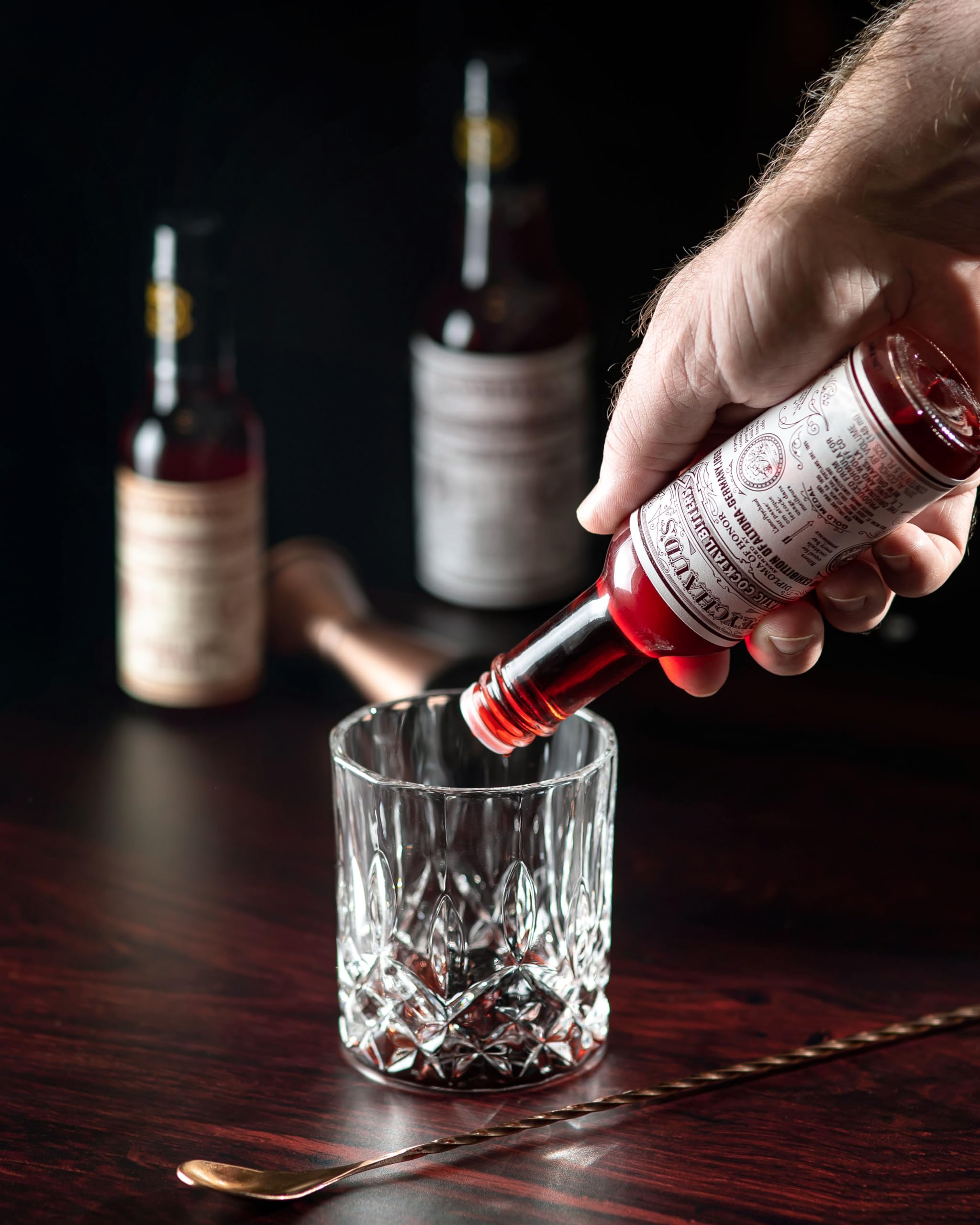 PEYCHAUD'S original formula label signals timeless quality for mixed drinks