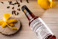 PEYCHAUD'S bottle pour shows even aroma release for balanced drinks