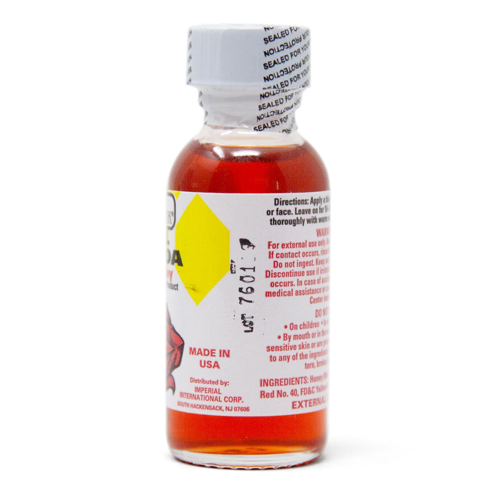 Close-up of Pharmark Pink Honey label highlighting quality and origin cues.