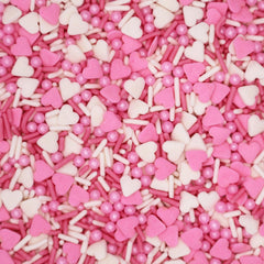 PhilaeEC Vanlentine sprinkles on cupcakes for festive color