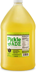 PickleAde Real Dill Pickle Juice Turmeric 1-gallon bottle on shelf for hydration and flavor.
