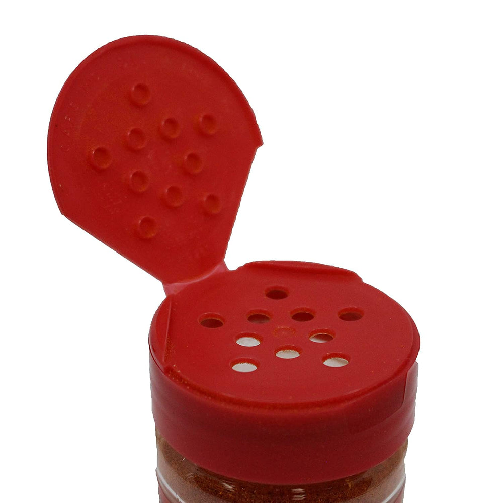 Pico De Gallo Spicy Chile Salt shaker dispensing a light dusting of spice