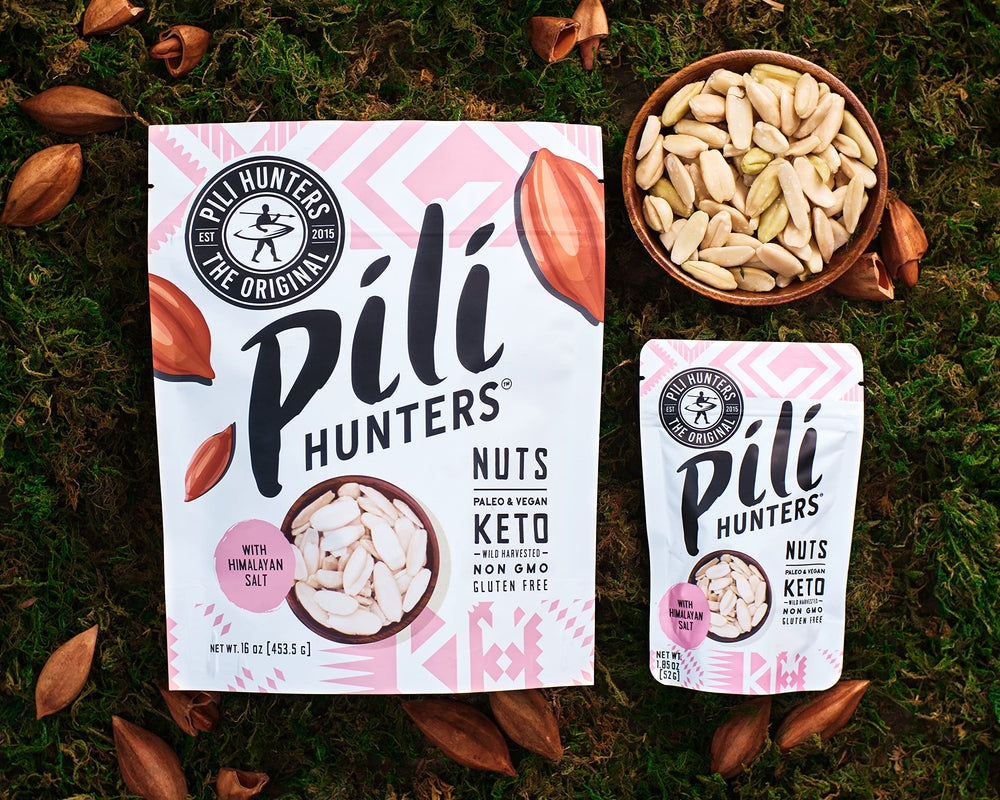 Pili Hunters close-up of sprouted nuts showing rich oil naturally.