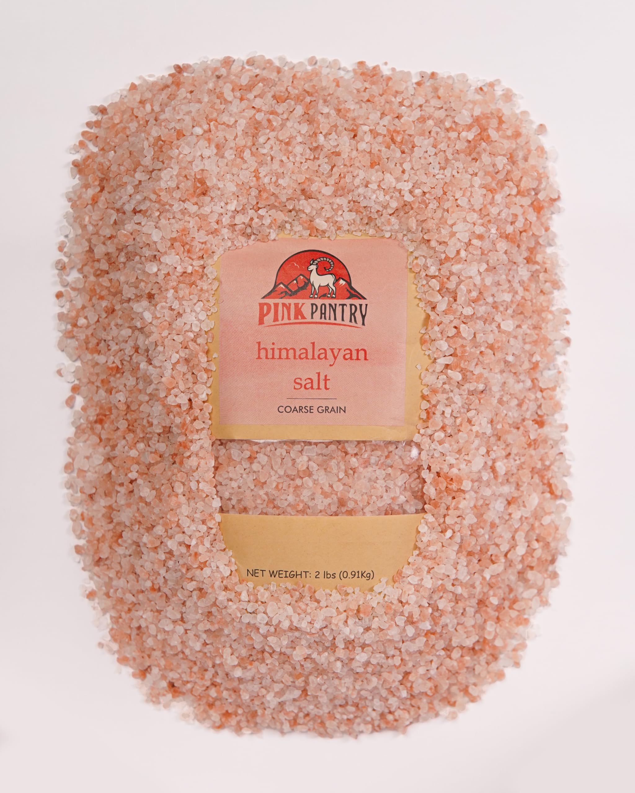 Pink Pantry salt close-up reveals pink hue and mineral specks.